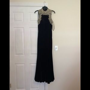 Betsy &Adam black velvet gown with gold detailing